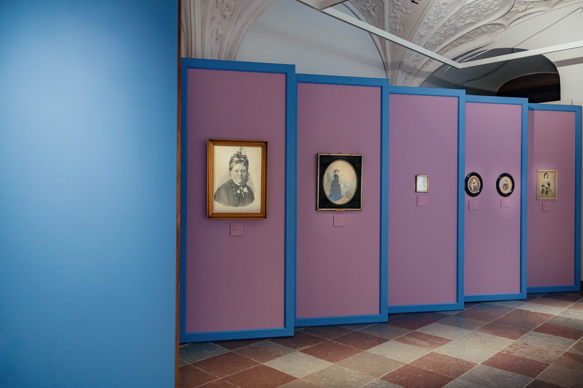 Danner af Danmark, row of pink panels with portraits of Countess Danner's many faces