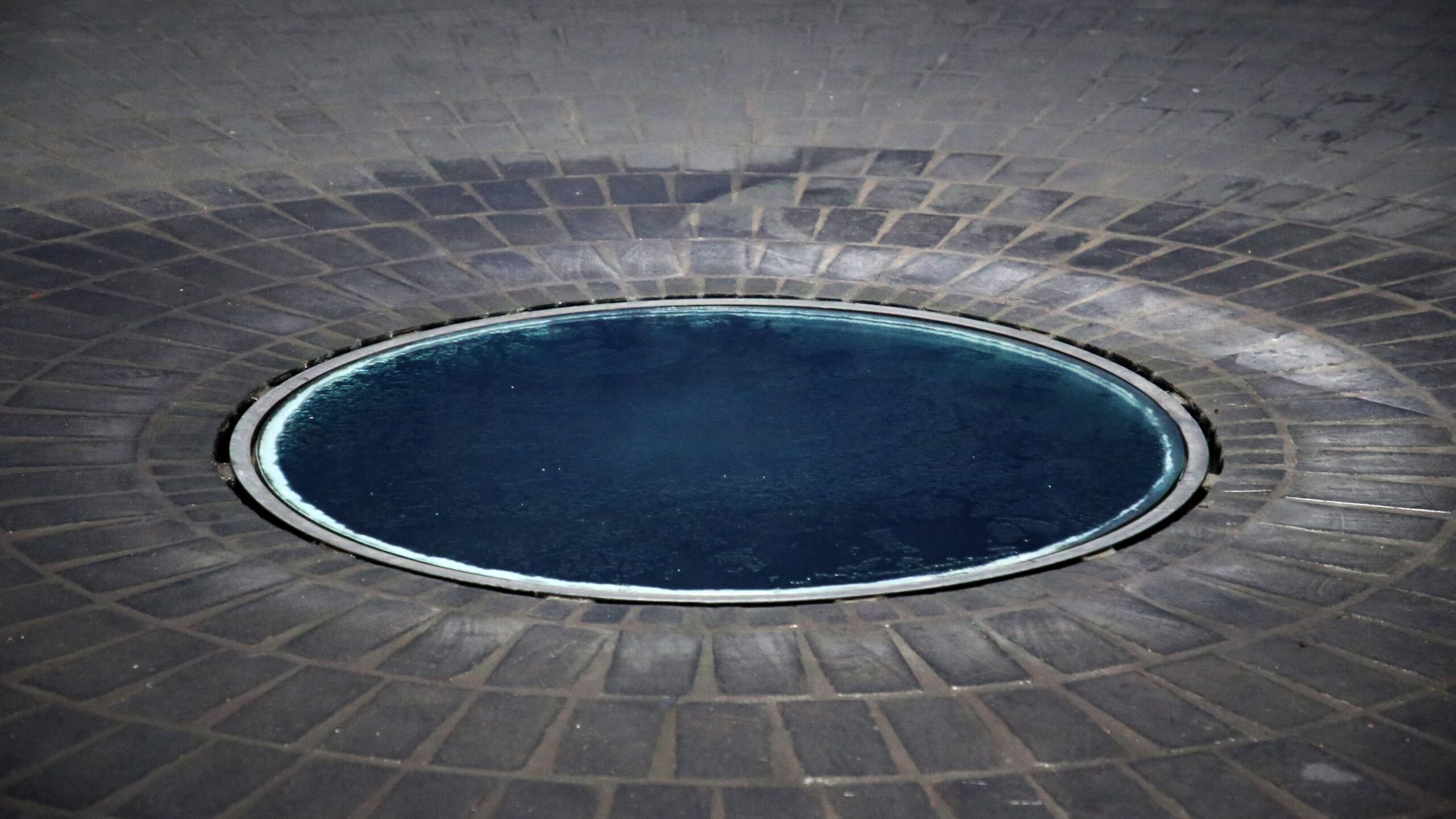 Opus Morturarium, the round pool of water in the stone floor
