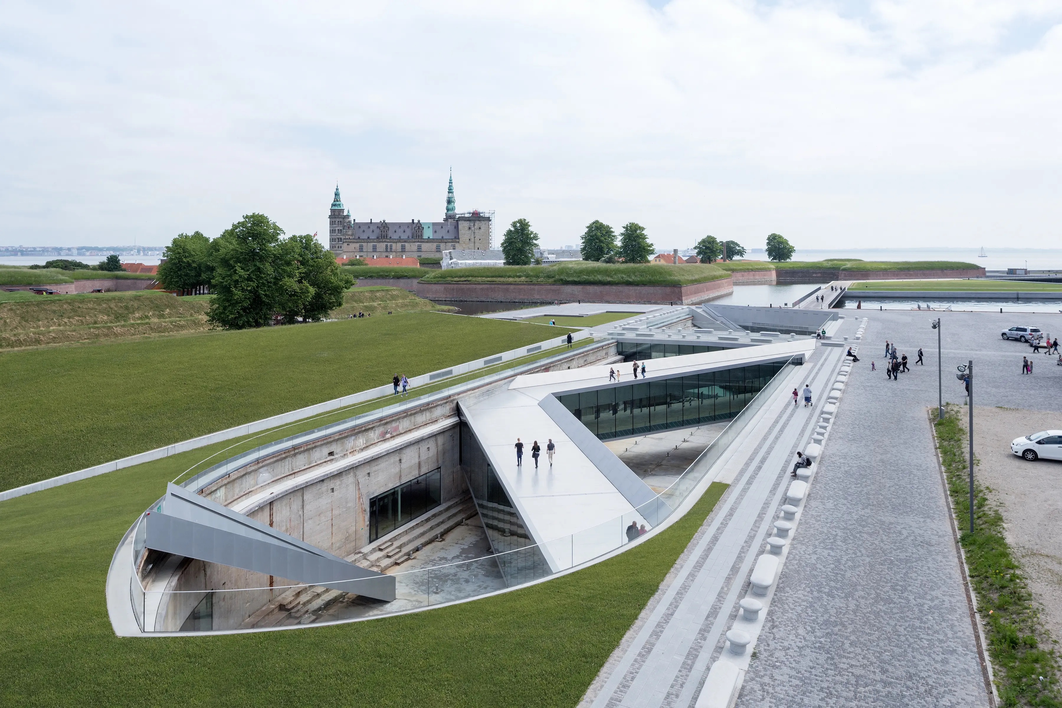 M/S Museet for Søfart in Helsingør, the museum in the old dry dock with Kronborg behind